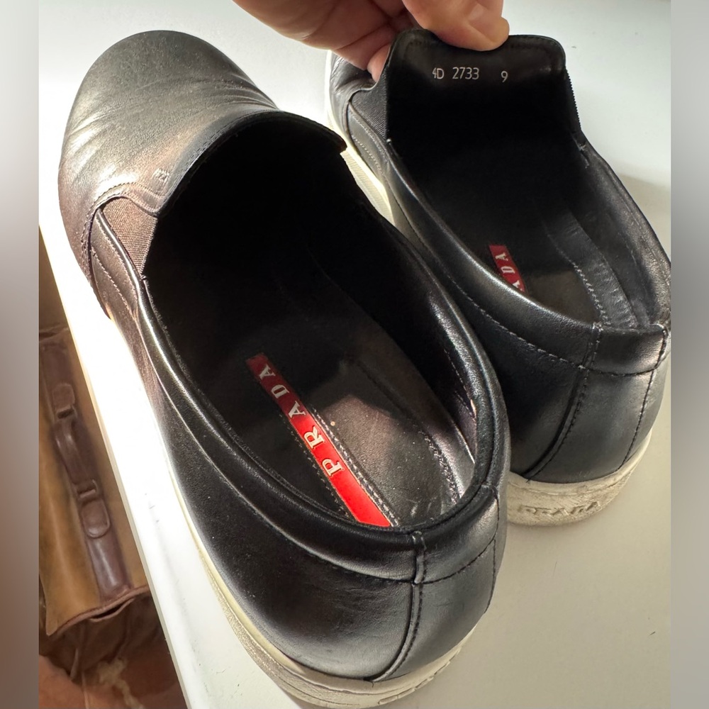 Prada Men's Black Slip-On Loafers..
Fit large I’m 10.5 - 11 and fit perfectly. - Picture 6 of 8